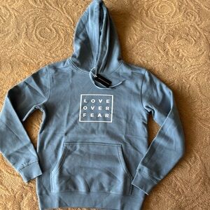 Love over fear seek discomfort, hoodie brand new with original tags